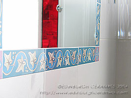 detail of ceramic tile mirror frame